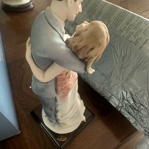 Giuseppe Armani man and woman figurine